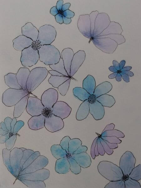 Watercolour blossom flowers of different shapes and sizes in varying shades of blue and purple