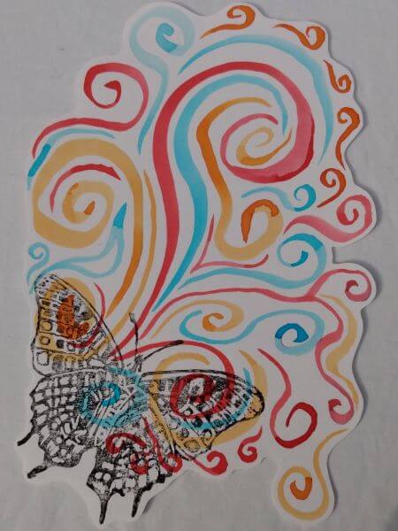 A lino print of a butterfly in black ink on a background of multicoloured swirls in watercolours