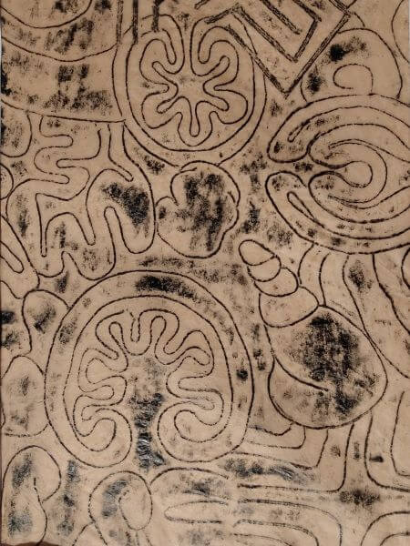 Black Printed pattern inspired by elements of the natural world on bronze tissue paper