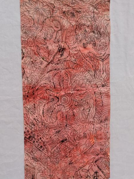 Black Printed pattern inspired by elements of the natural world on a red painted watercoloured background