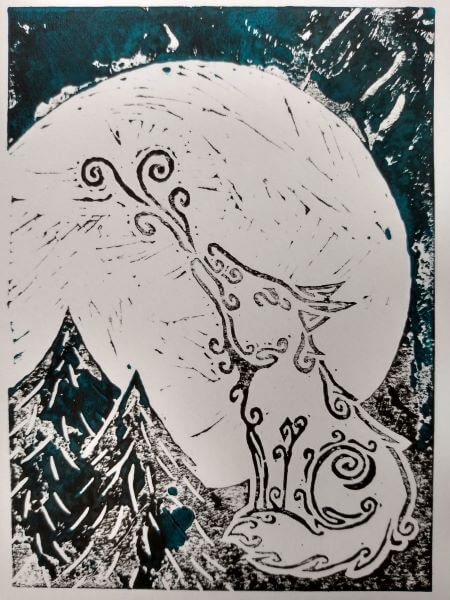 Lino print in black and turquoise of a tribal patterned wolf howling to the moon in the forest