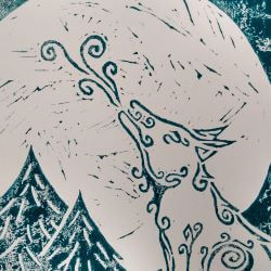 Lino print in green of a tribal patterned wolf howling to the moon in the forest