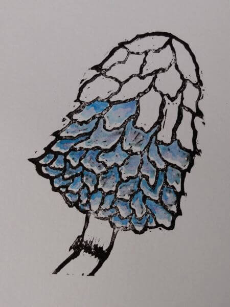 A lino print in black of a Shaggy Inkcap Mushroom painted in shades of blue watercolours