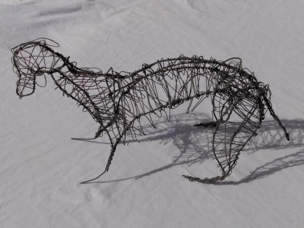 Sulpture of a dog made out of twisted and wrapped wire